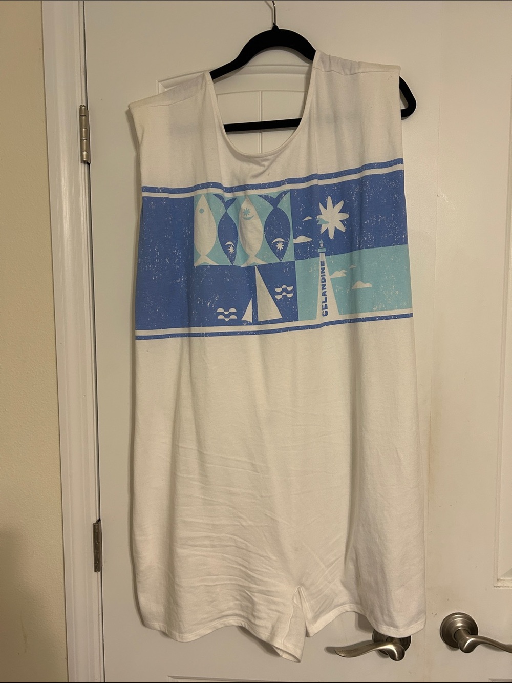 White Sleeveless Graphic Romper with Light Blue Panel